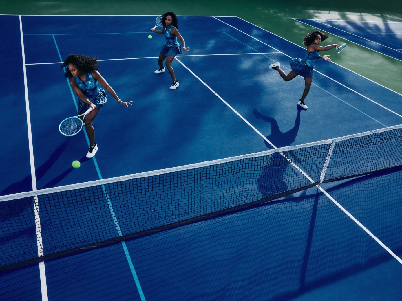 Coco Gauff seen from above, moving across a blue hard court in a multi-exposure