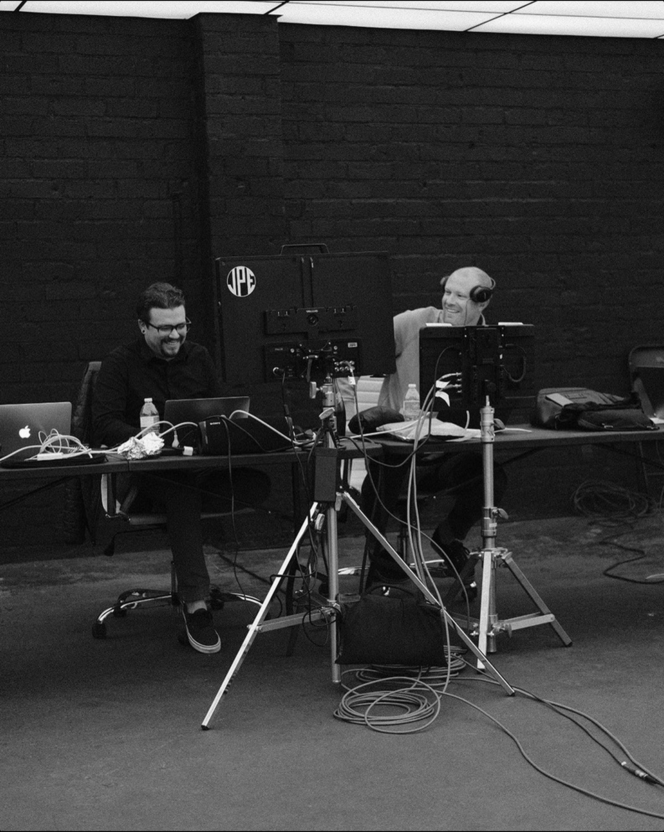 Derek and Josh at video village on a Los Angeles set