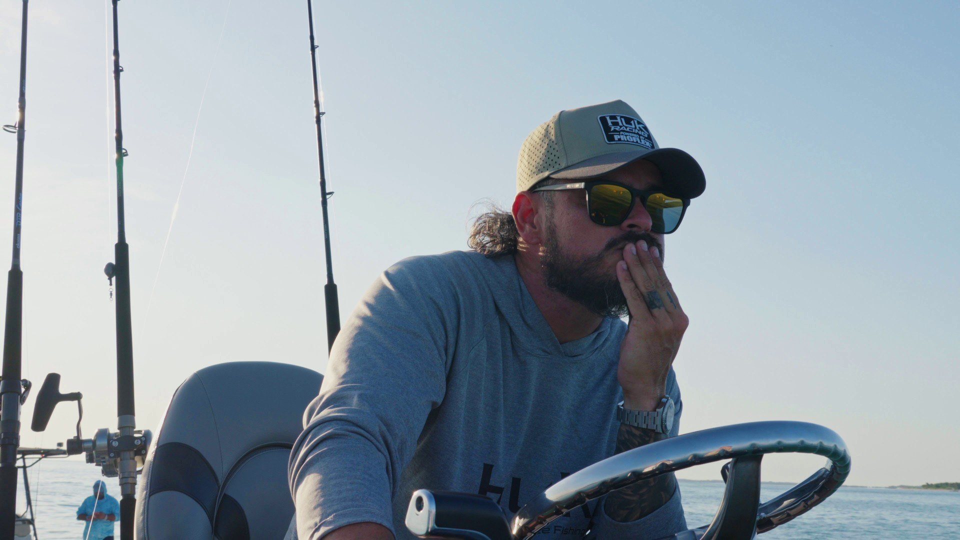 James “Marko” Markovits at the wheel of a boat on Smith Lake