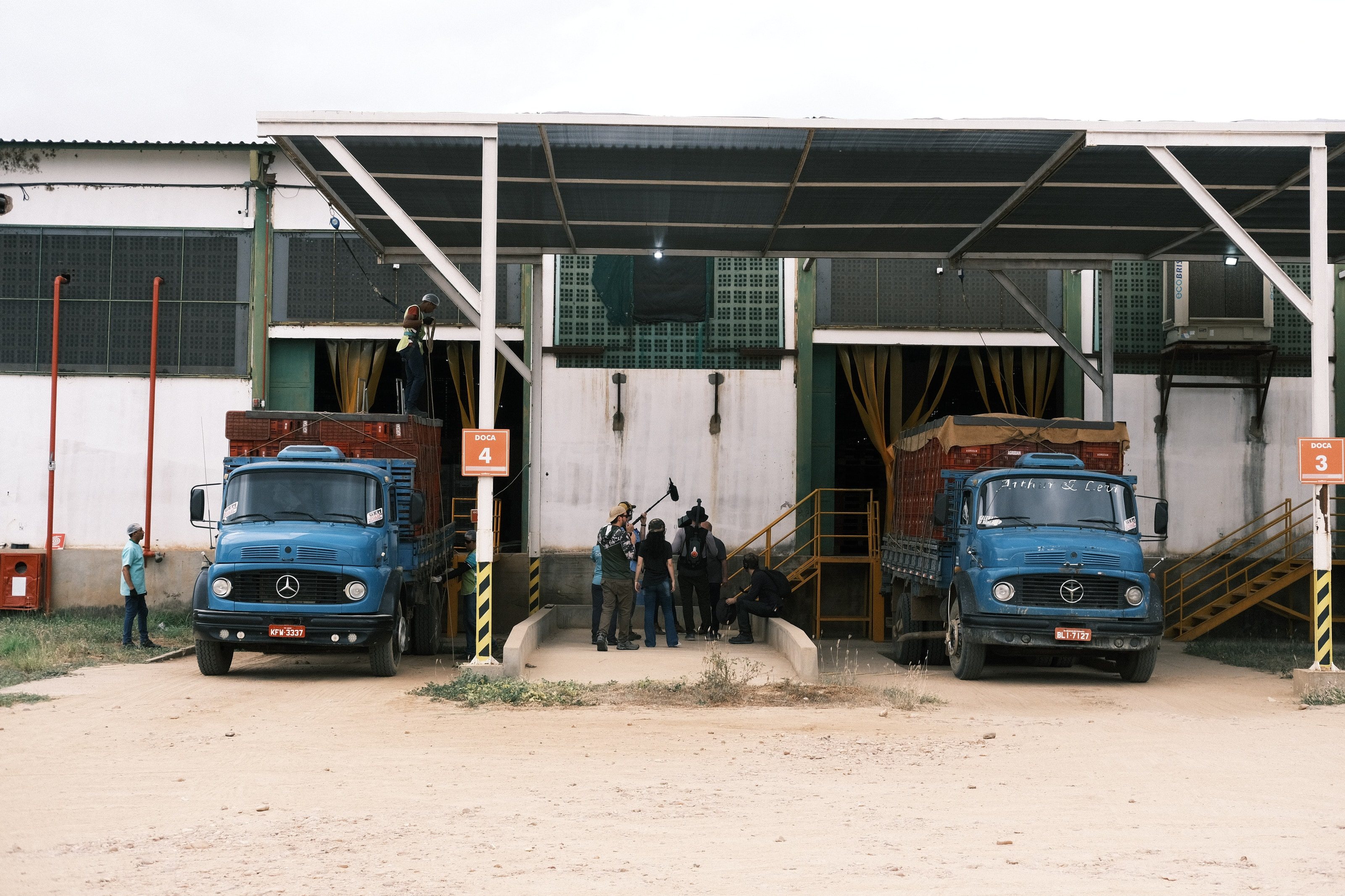 The crew filming at a packing house